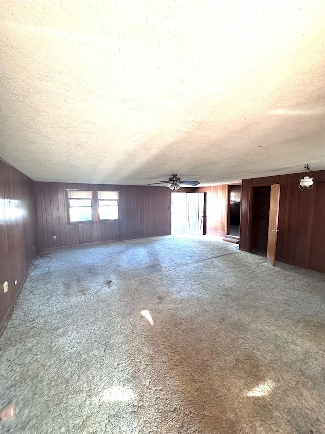 Entering the large Family/Gameroom/Den/Living from back door.