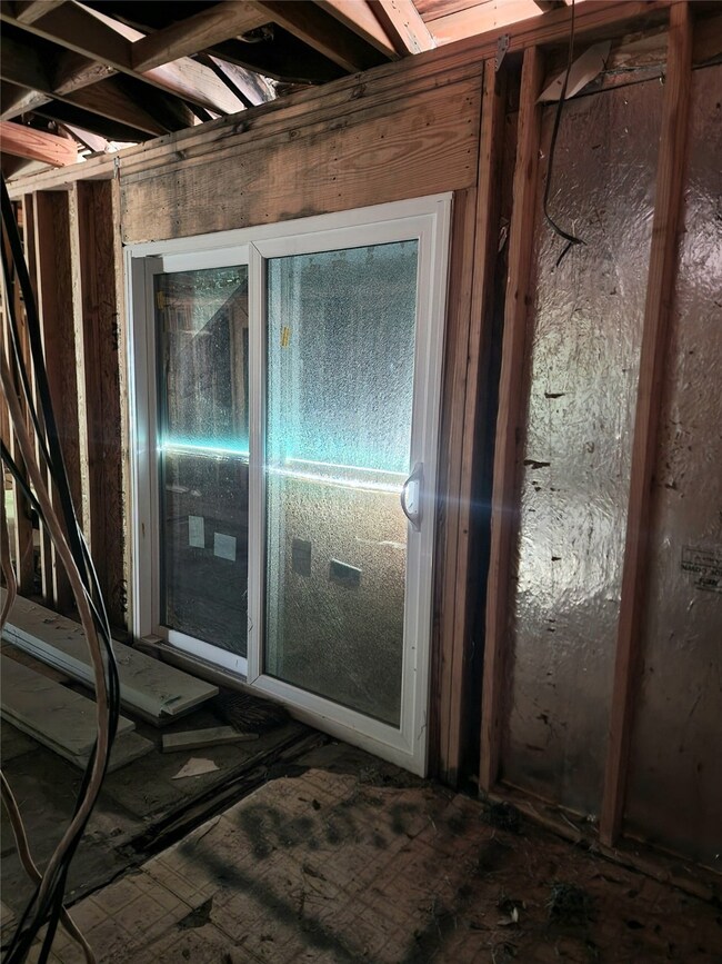 sliding door leads to covered back patio