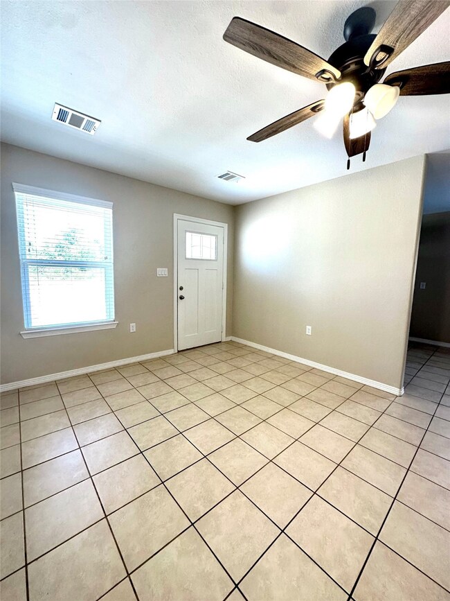 View of the living room towards the front door.