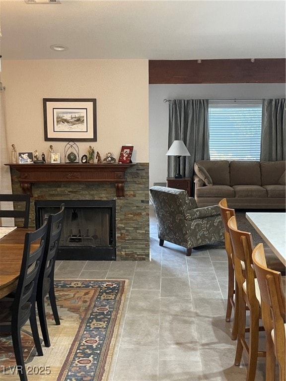 Dining space with a fireplace