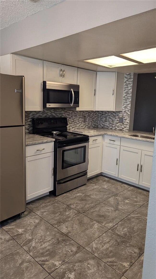 Lovely kitchen with granite countertops