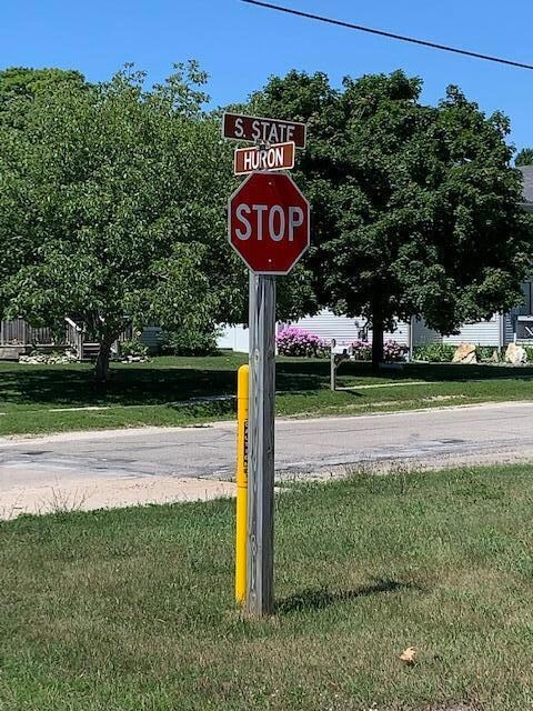 S State & Huron Street Sign