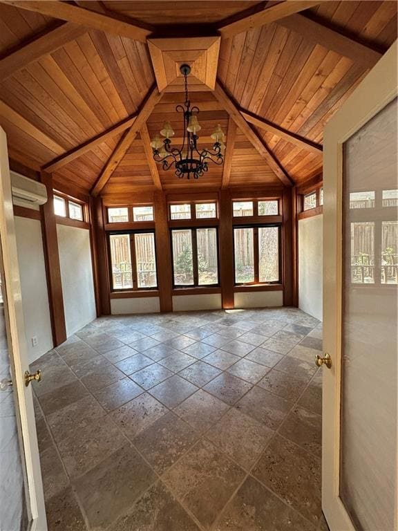 Unfurnished sunroom featuring an inviting chandeli