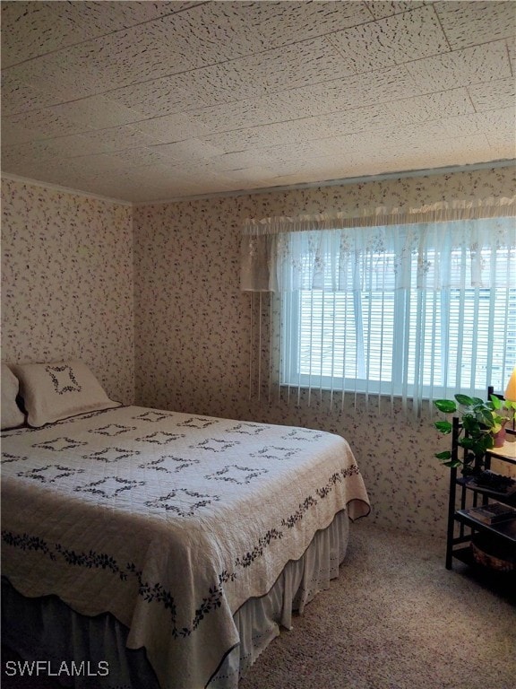 Bedroom featuring carpet flooring