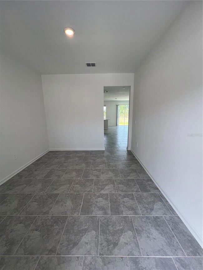 3299 Laurent Loop, Davenport, FL 33837 - photo 5