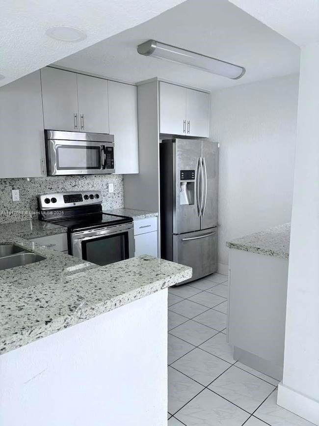 1175 NW 124th Place unit 101, Miami, FL 33182 - photo 7