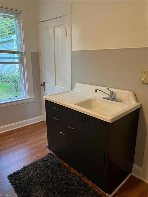 Kitchen 14 x 11 with laminate flooring.