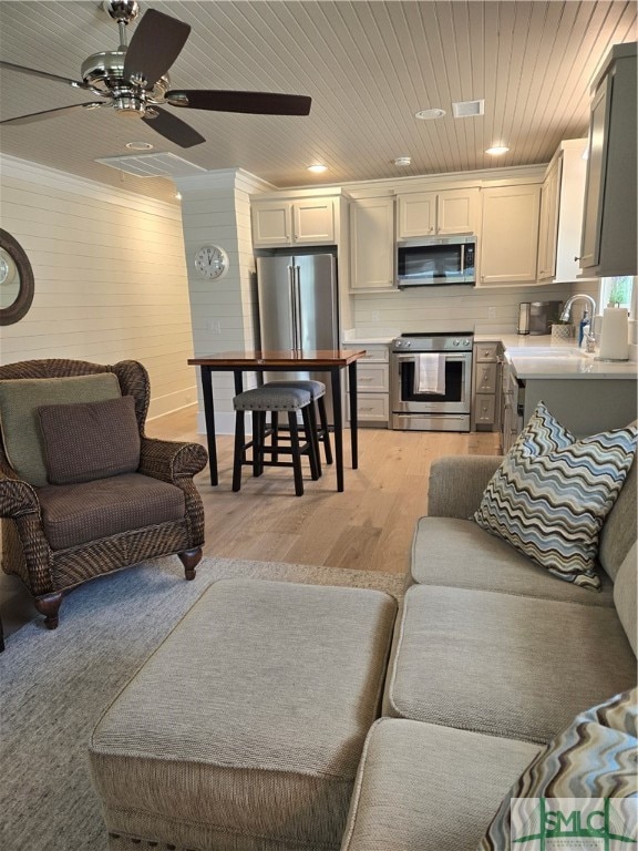 Living room with 2 large chairs/ottomans