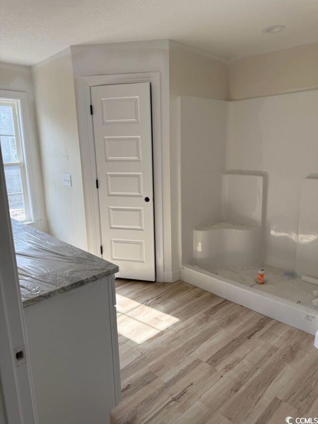 Bathroom featuring hardwood / wood-style floors, a