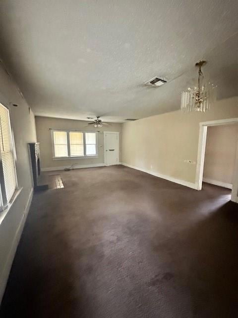 Unfurnished living room with ceiling fan, baseboar