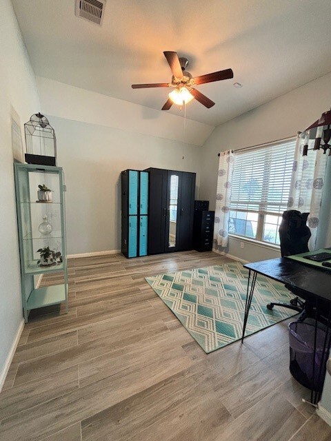 This room is bright and spacious with a modern cei