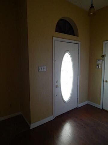 Front Entry with laminate wood flooring