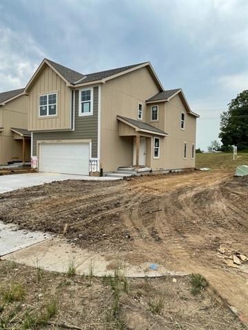 1401 Newport Ln, Raymore, MO 64083 - photo 3