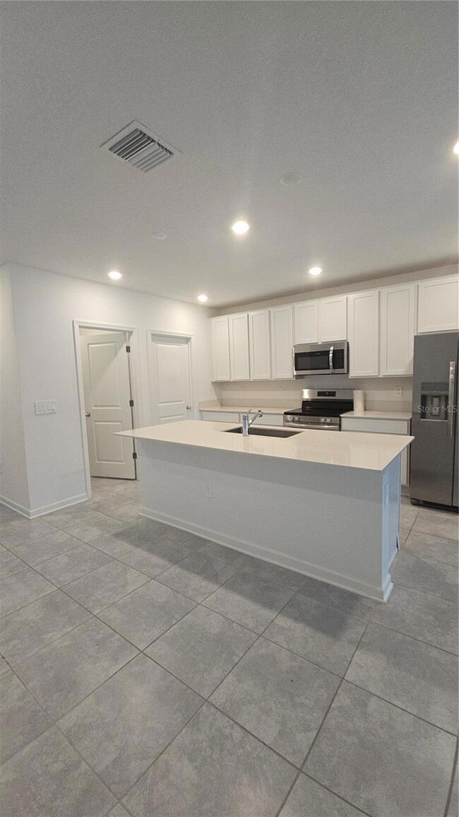 4253 Twisted Twig Bend, Kissimmee, FL 34746 - photo 5