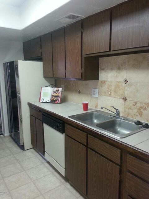 Tiled counters terrazo back splash