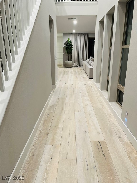 Hall featuring hardwood / wood-style flooring