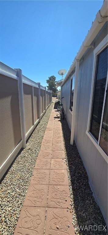 Walkway leading to the rear patio