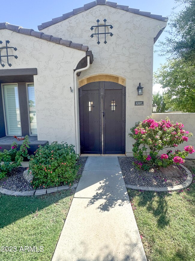 Front yard view to entrance of courtyard