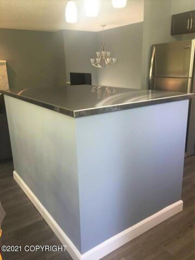 Kitchen island, washer dryer in it