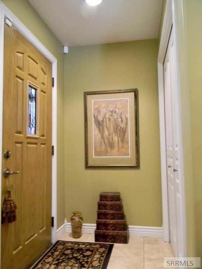 Front door & coat closet