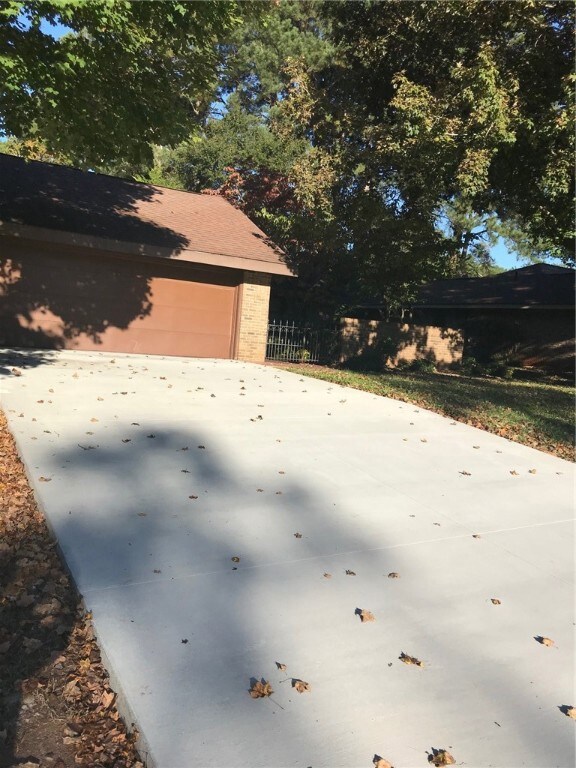 Brand new concrete driveway meets neighborhood req