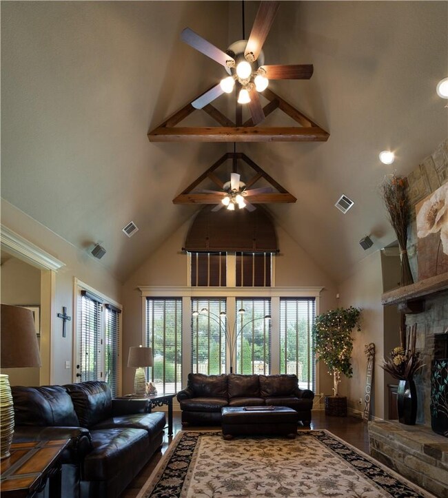 Gorgeous living room with soaring ceilings.