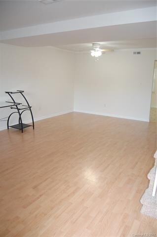 View of the living room toward the dining area - d