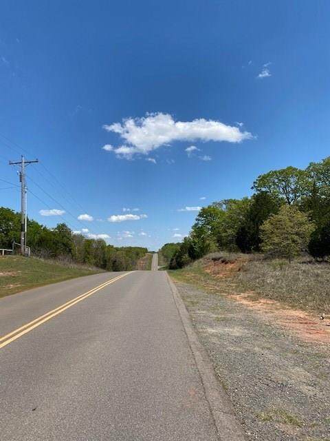 Looking East of the entrance on Etowah Rd. Property on the South.