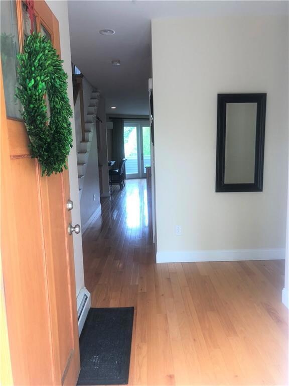 The front entryway hallway leads...