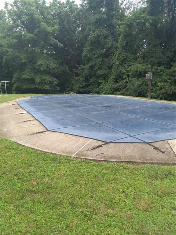 Inground pool and cover.