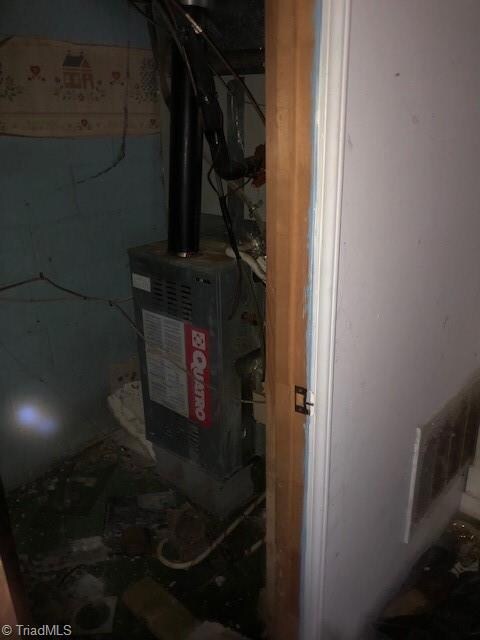 Basement Mechanical Room: Here we can see the natural gas forced warm air furnace