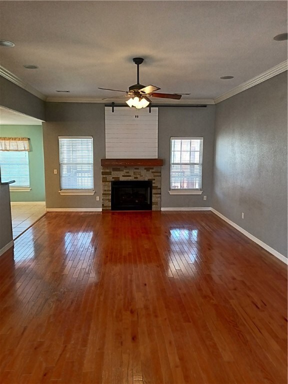 Front entry views into the living room. Interesting storage area above mantle.