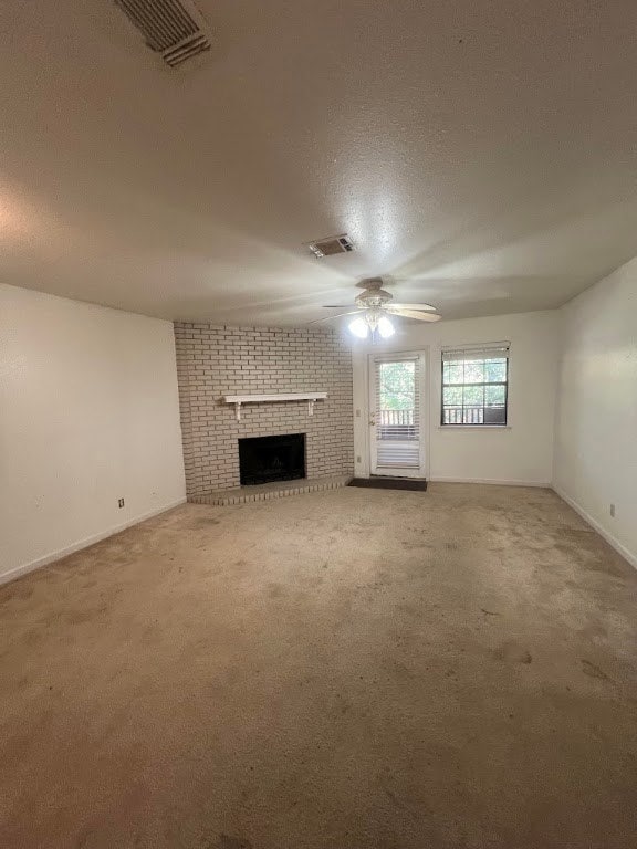Unfurnished living room with a textured ceiling, c