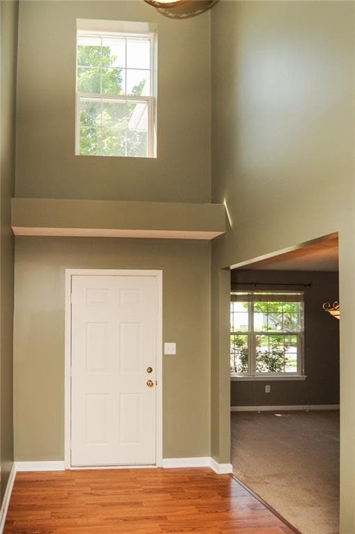 Soaring 2-Story foyer open to the dining room
