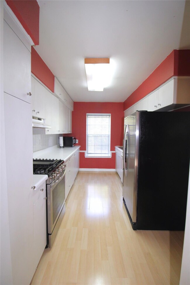 Kitchen featuring light hardwood / wood-style floo