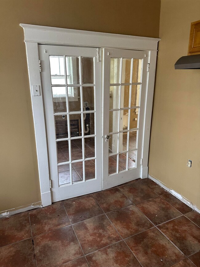 Doorway to outside featuring french doors