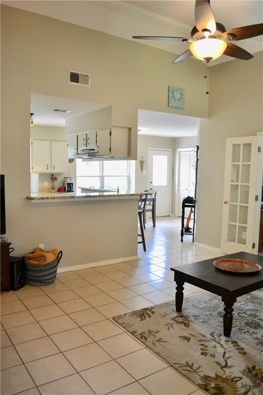 Living room looking into the kitchen and dining ar