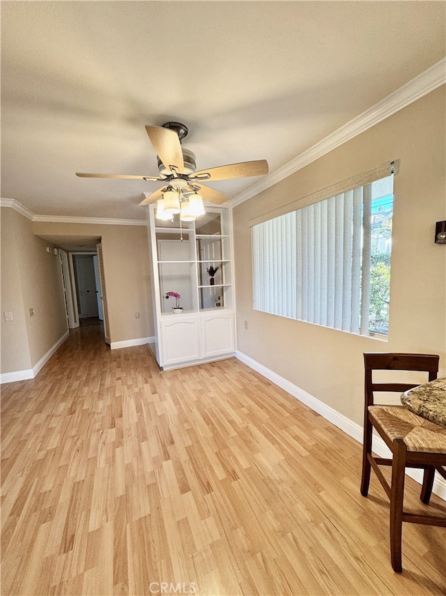Open dining area featuring a built-in display case—perfect for showcasing décor, collectibles, or fine china