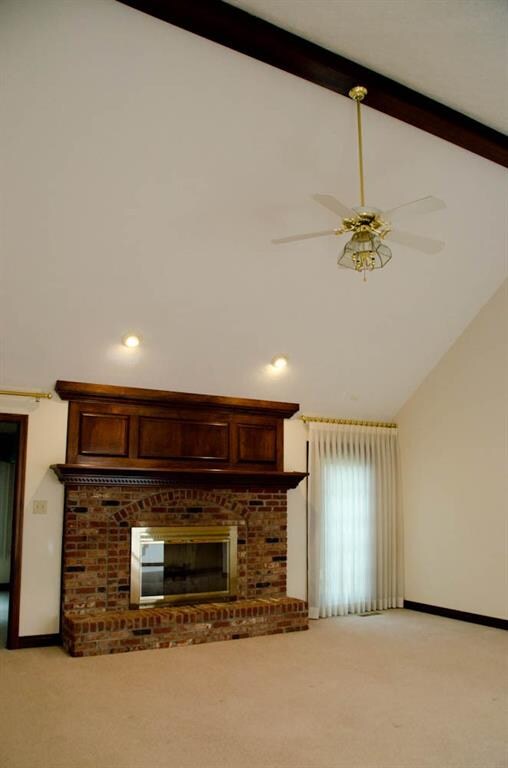 Great room with gas fireplace and vaulted ceiling