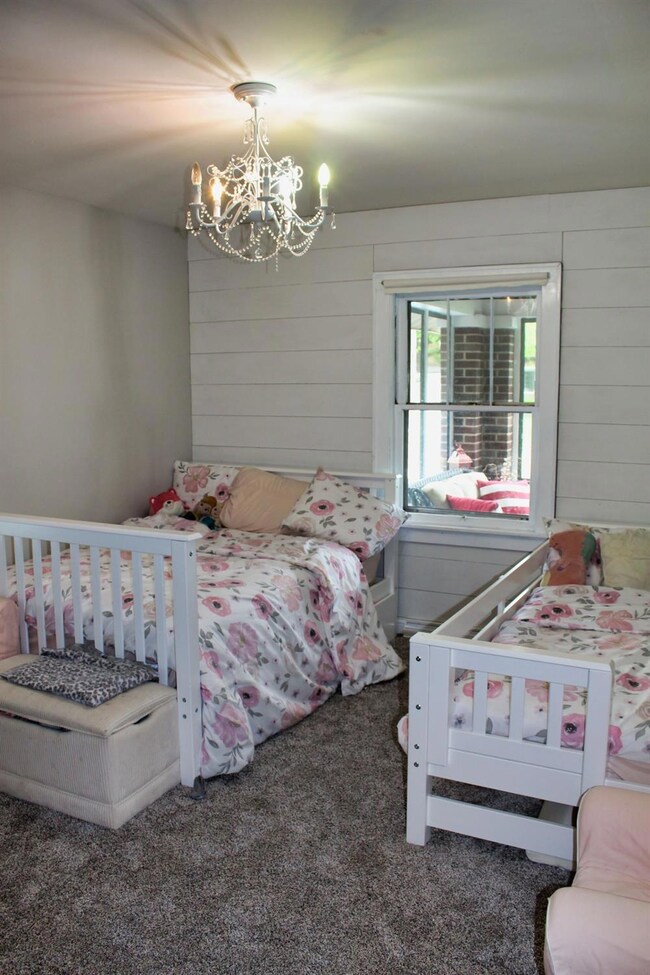 Second bedroom features wall to wall carpet, wood 