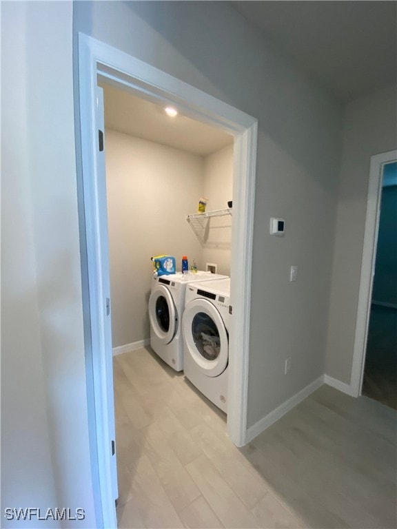 Washroom featuring light hardwood / wood-style flo