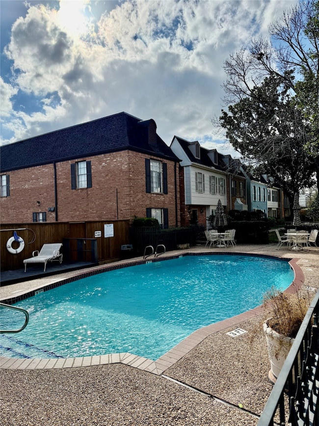 Spend hot Houston days in this sparkling pool just steps from your door