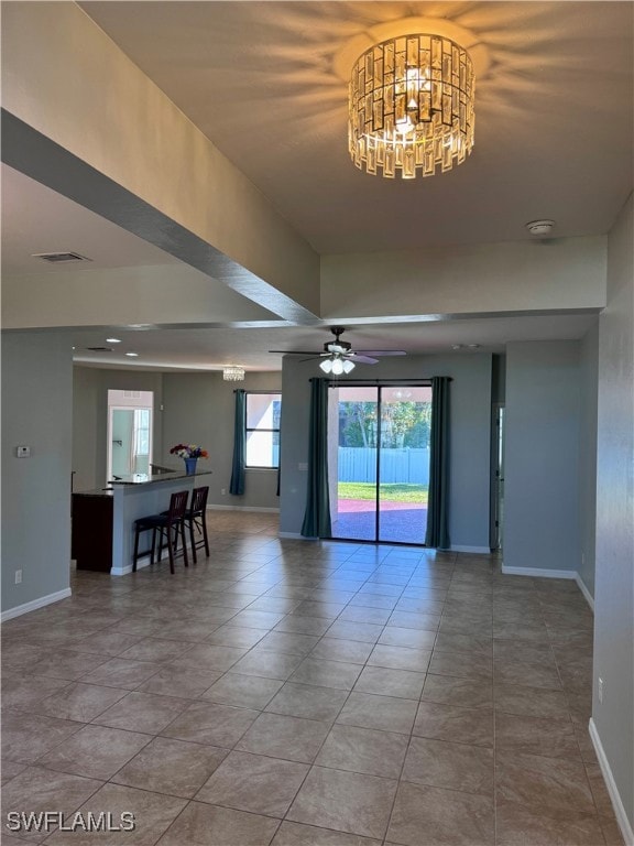 Spare room featuring tile patterned flooring, ceil