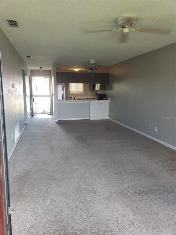 View of the living/dining room and kitchen from the balcony