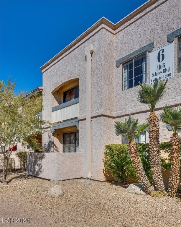 View of side of building with stucco siding