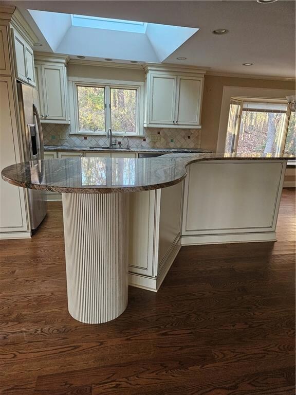 Kitchen with a skylight, a wealth of natural light