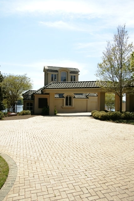 Driveway view to guest house/boat house