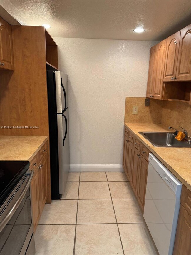 14221 N Kendall Dr unit 406-C, Miami, FL 33186 - photo 4