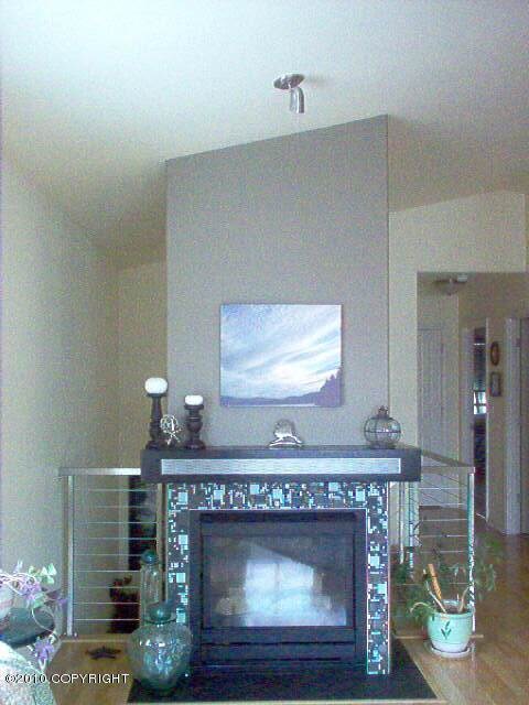 Custom Railing Behind Gas Fireplace, to