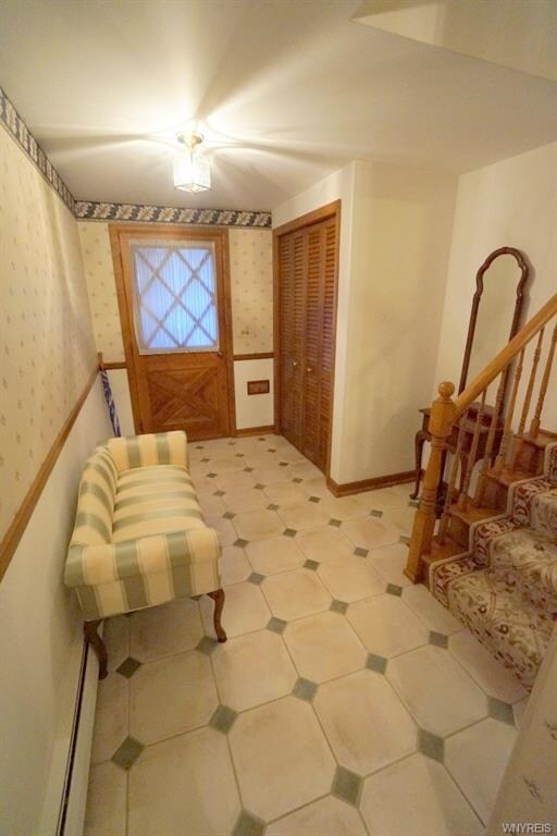 Welcoming Large foyer with tasteful ceramic tile. 